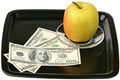 Моя фотография «Доллары и яблоко на подносе» в фотобанке «Лори»